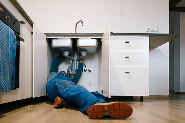 Professional Drain Cleaning technician working in Saint Cloud, WI